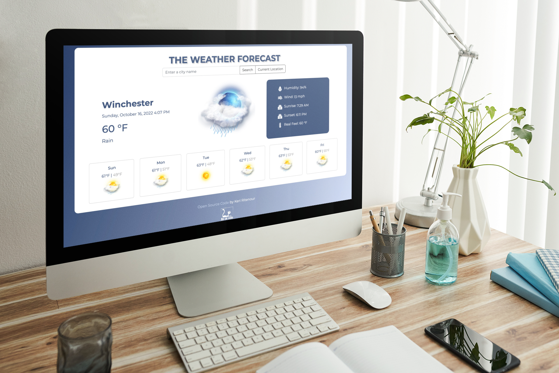 weather app on a computer mockup
